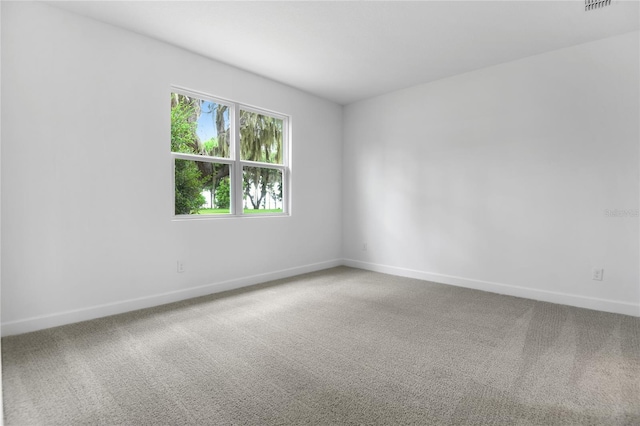 4083 Bannock Ave, Tavares, FL 32778 - unfurnished room with carpet floors and baseboards