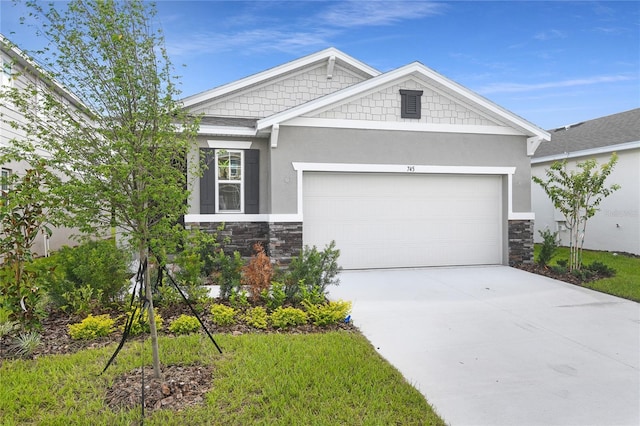 4079 Bannock Ave, Tavares, FL 32778 - craftsman inspired home with stone siding, stucco siding, driveway, and an attached garage