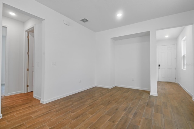 4079 Bannock Ave, Tavares, FL 32778 - unfurnished room featuring wood finished floors and recessed lighting