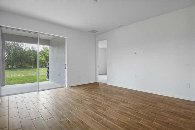 4079 Bannock Ave, Tavares, FL 32778 - spare room with dark wood finished floors and baseboards