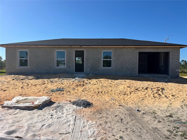 exterior space with stucco siding