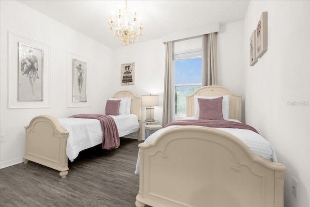 bedroom with baseboards, dark wood-style flooring, and a chandelier