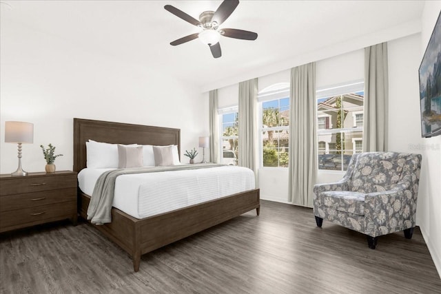 bedroom with ceiling fan and wood finished floors