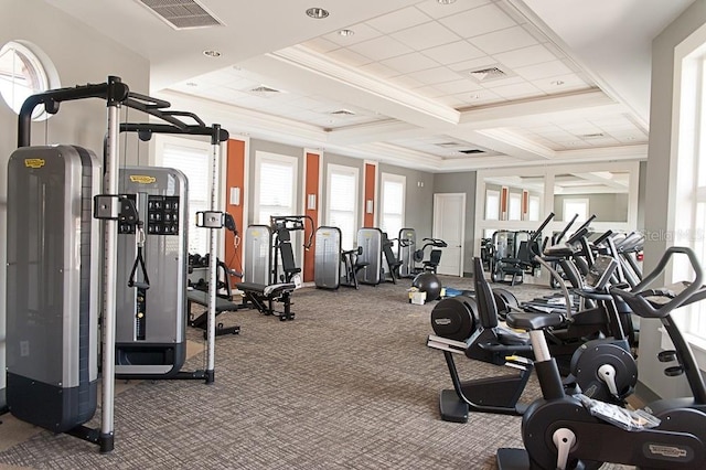 exercise room with coffered ceiling, visible vents, and crown molding