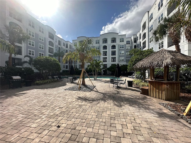 304 E S St Unit 5020, Orlando, FL 32801 - surrounding community featuring a pool and a patio area