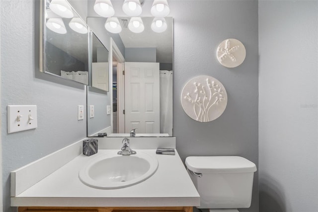 1048 Lake Berkley Dr, Kissimmee, FL 34746 - bathroom with toilet and vanity