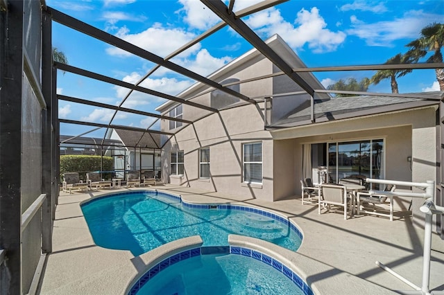 1048 Lake Berkley Dr, Kissimmee, FL 34746 - view of pool with a patio area, a pool with connected hot tub, and glass enclosure
