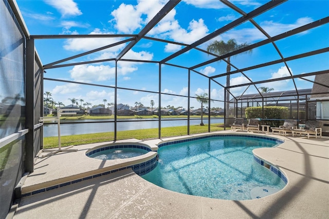 1048 Lake Berkley Dr, Kissimmee, FL 34746 - view of swimming pool featuring a water view, a patio area, a pool with connected hot tub, and a lanai