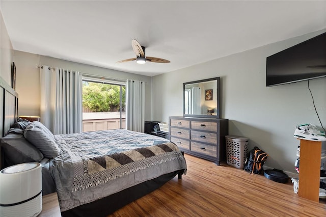 bedroom featuring wood finished floors and ceiling fan