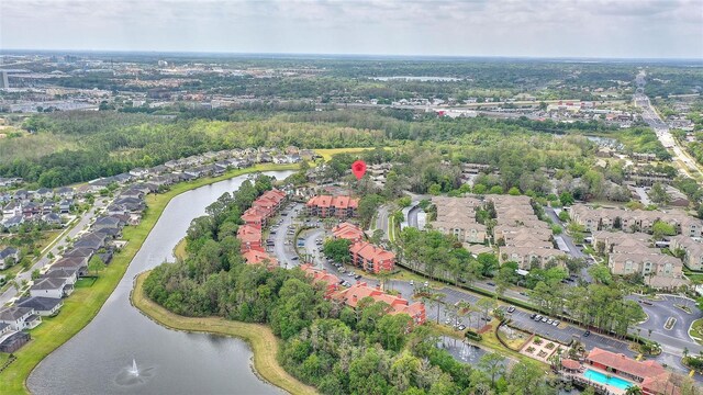 bird's eye view with a residential view and a water view