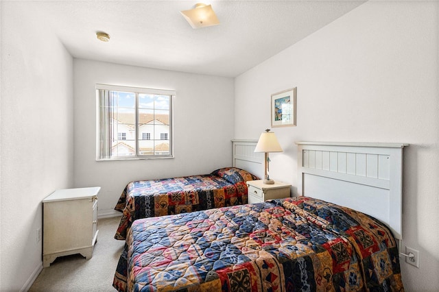 1149 S Beach Cir, Kissimmee, FL 34746 - carpeted bedroom featuring baseboards