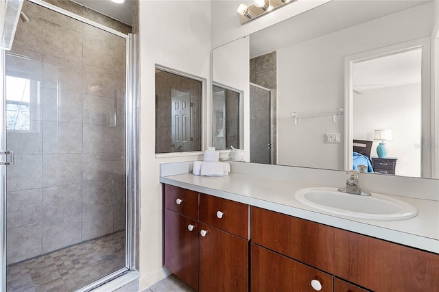 1149 S Beach Cir, Kissimmee, FL 34746 - ensuite bathroom with a stall shower, vanity, and ensuite bath