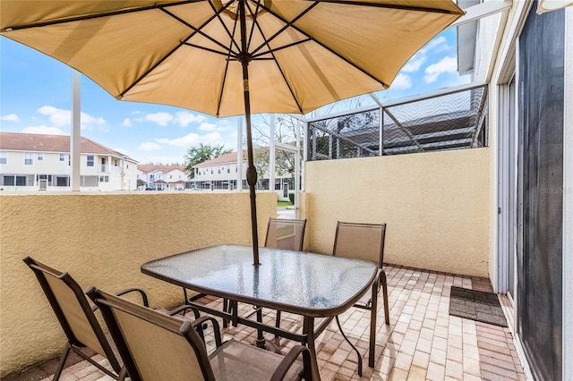 1149 S Beach Cir, Kissimmee, FL 34746 - balcony featuring a sunroom and a residential view