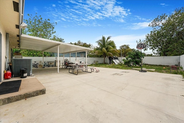 view of patio / terrace featuring central AC unit and a fenced backyard