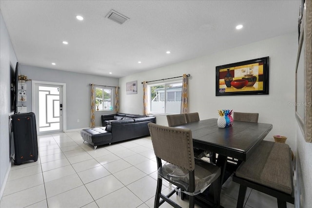 dining space with recessed lighting, visible vents, baseboards, and light tile patterned flooring