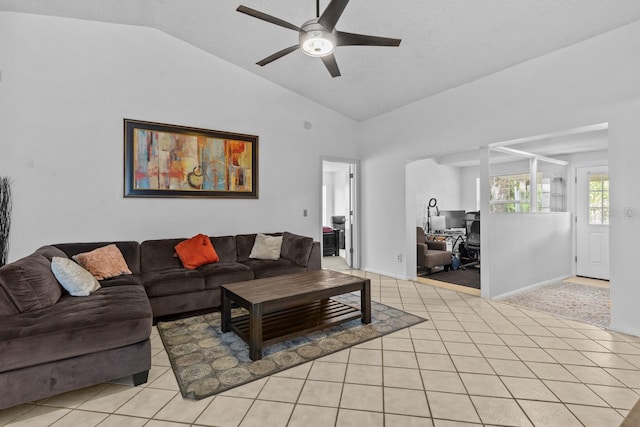 1345 Tindaro Dr, Apopka, FL 32703 - living area with vaulted ceiling, ceiling fan, and light tile patterned floors