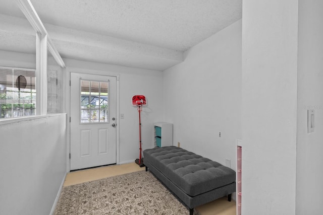 1345 Tindaro Dr, Apopka, FL 32703 - carpeted entryway with baseboards and a textured ceiling