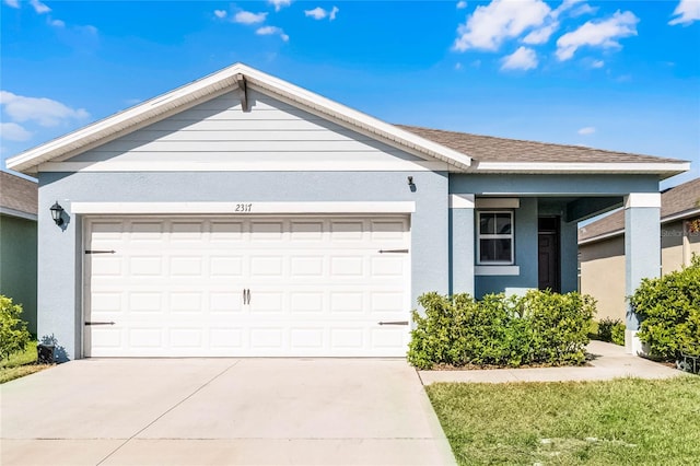 2317 Tay Wes Dr, Saint Cloud, FL 34771 - ranch-style house with stucco siding, a shingled roof, a garage, and concrete driveway