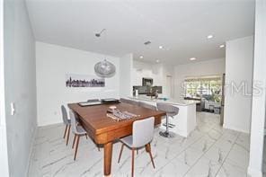 1237 Tallow Rd Unit 1237, Apopka, FL 32703 - dining area with marble finish floor, baseboards, and recessed lighting