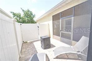 1237 Tallow Rd Unit 1237, Apopka, FL 32703 - view of patio / terrace with fence private yard