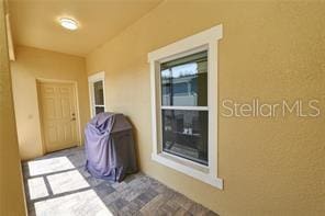 1237 Tallow Rd Unit 1237, Apopka, FL 32703 - doorway to property with stucco siding