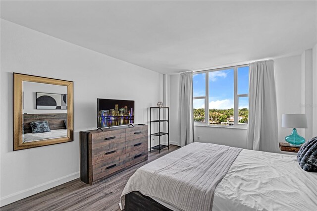 5600 Collins Ave Unit 6P, Miami Beach, FL 33140 - bedroom with wood finished floors and baseboards