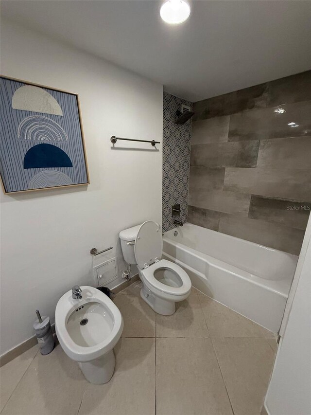 5600 Collins Ave Unit 6P, Miami Beach, FL 33140 - bathroom with toilet,  shower combination, tile patterned flooring, and a bidet