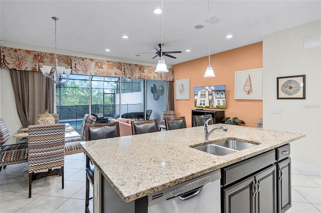 510 Captiva Dr, Davenport, FL 33896 - kitchen with a sink, stainless steel dishwasher, open floor plan, ceiling fan with notable chandelier, and visible vents