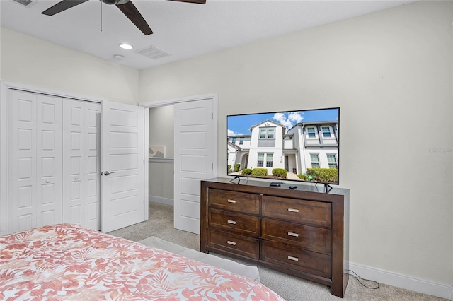 510 Captiva Dr, Davenport, FL 33896 - bedroom featuring baseboards, visible vents, a closet, and light carpet