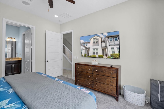 510 Captiva Dr, Davenport, FL 33896 - bedroom featuring baseboards, carpet floors, connected bathroom, visible vents, and ceiling fan