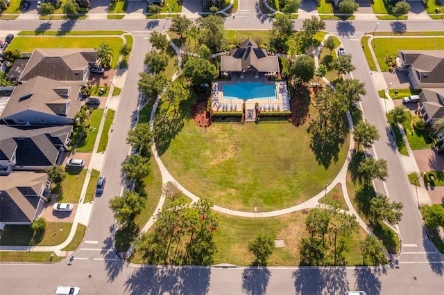 birds eye view of property with a residential view