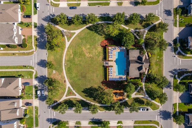 birds eye view of property with a residential view