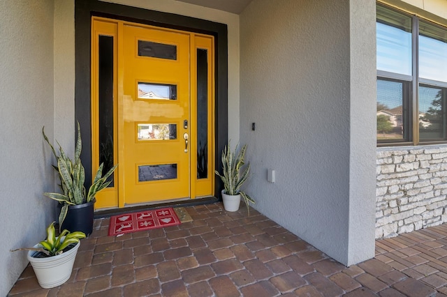 2566 Trielle Ave, Kissimmee, FL 34741 - entrance to property featuring stone siding and stucco siding