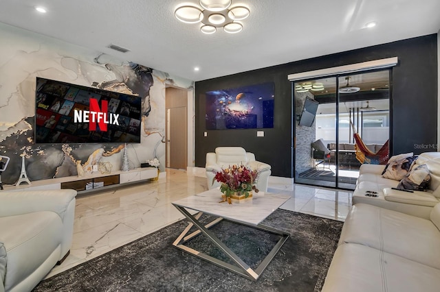 2566 Trielle Ave, Kissimmee, FL 34741 - living room with marble finish floor, recessed lighting, a textured ceiling, and visible vents