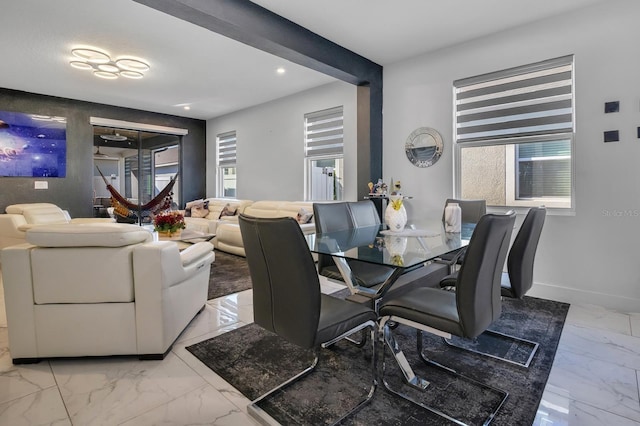 2566 Trielle Ave, Kissimmee, FL 34741 - dining space featuring baseboards, marble finish floor, and recessed lighting