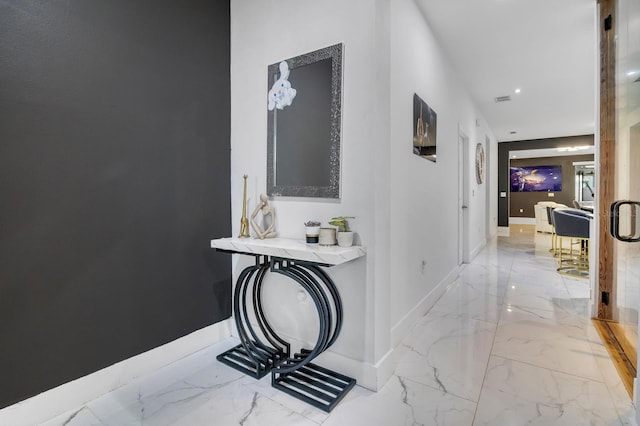 2566 Trielle Ave, Kissimmee, FL 34741 - hall featuring marble finish floor, baseboards, and recessed lighting