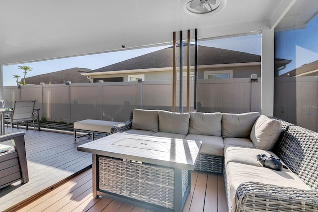 2566 Trielle Ave, Kissimmee, FL 34741 - wooden deck featuring a fenced backyard, outdoor dining area, and outdoor lounge area