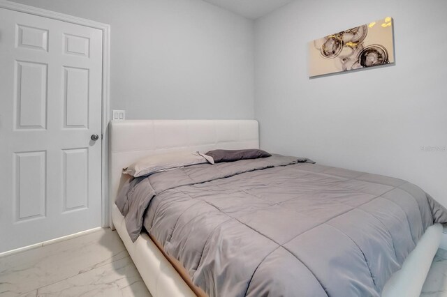 2566 Trielle Ave, Kissimmee, FL 34741 - bedroom with marble finish floor