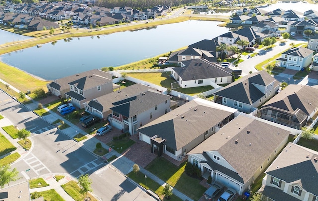 2566 Trielle Ave, Kissimmee, FL 34741 - drone / aerial view with a water view and a residential view