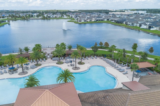 2566 Trielle Ave, Kissimmee, FL 34741 - community pool featuring a residential view, a water view, and a patio