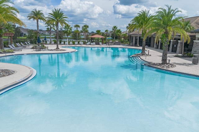 2566 Trielle Ave, Kissimmee, FL 34741 - pool featuring a patio area