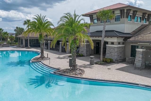 2566 Trielle Ave, Kissimmee, FL 34741 - pool featuring a patio area