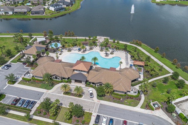 2566 Trielle Ave, Kissimmee, FL 34741 - drone / aerial view featuring a residential view and a water view