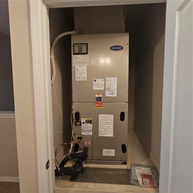 utility room with heating unit