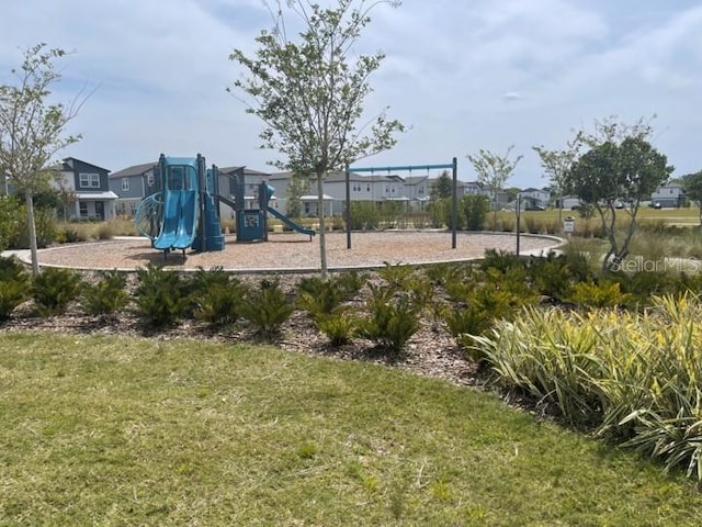 5273 Sanders Oak Trl, Saint Cloud, FL 34771 - communal playground with a residential view and a lawn