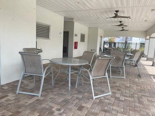 5273 Sanders Oak Trl, Saint Cloud, FL 34771 - view of patio / terrace with outdoor dining space, fence, and a ceiling fan