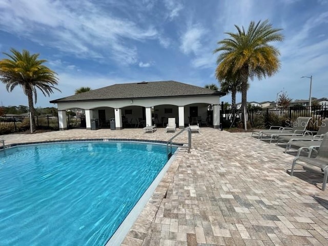 5273 Sanders Oak Trl, Saint Cloud, FL 34771 - community pool featuring fence and a patio