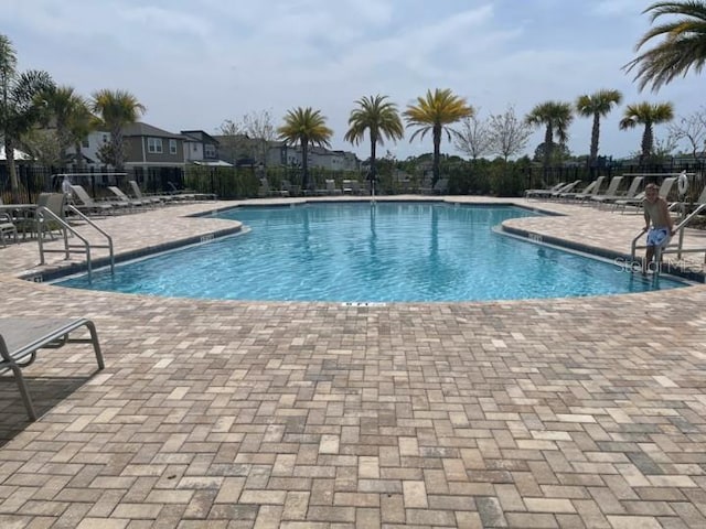 5273 Sanders Oak Trl, Saint Cloud, FL 34771 - pool with a patio and fence