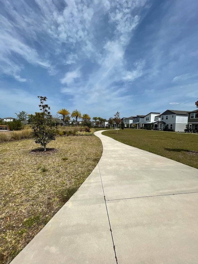 5273 Sanders Oak Trl, Saint Cloud, FL 34771 - surrounding community with a residential view and a yard