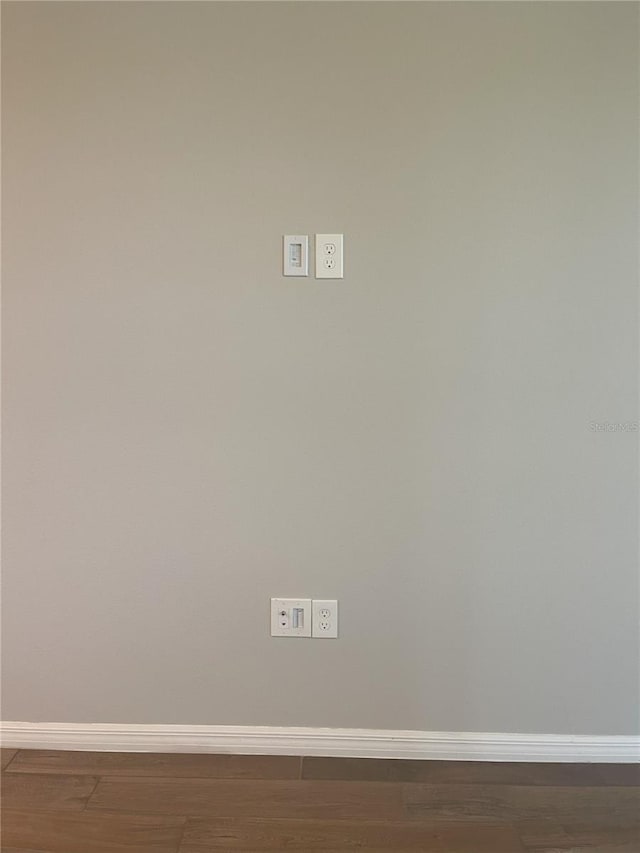 5273 Sanders Oak Trl, Saint Cloud, FL 34771 - room details with baseboards and wood finished floors